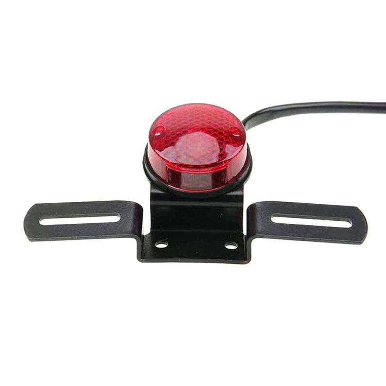 Luce freno rotonda retrò per moto 12V 35W con portatarga
