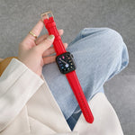 Cinturino in pelle con trama litchi per Apple Watch