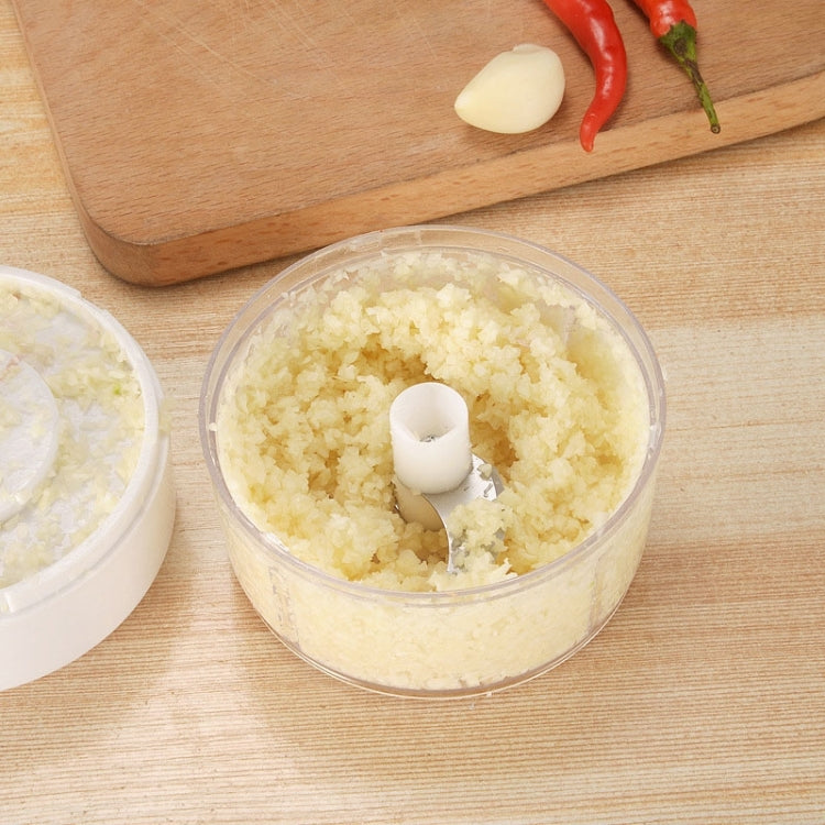 Dispositivo multifunzione per aglio manuale da cucina