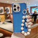 Custodia TPU glitterata con braccialetto per iPhone 15 Pro Max