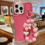 Custodia TPU glitterata con braccialetto per iPhone 15 Pro Max