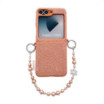 Custodia con cinturino da polso e ganci metallici per Samsung Galaxy Z Flip6/7