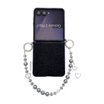 Custodia con cinturino da polso e ganci metallici per Samsung Galaxy Z Flip6/7