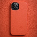 Custodia in vera pelle per iPhone 13 e 12 con cornice metallica