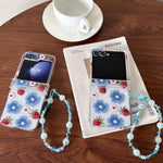 Custodia antiurto con cinturino e motivo a fiori per Samsung Galaxy Z Flip7 e