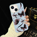 Custodia ibrida PC TPU con motivo farfalle per iPhone 15