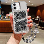 Custodia acrilico con perle e farfalla per iPhone 17 Pro Max