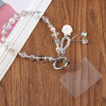 Ciondolo ballerina con cinturino per cellulare e perline