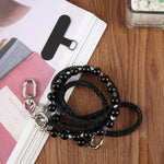 Cordino per cellulare con strass e perle regolabile