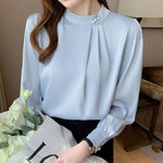 Camicetta donna in chiffon maniche lunghe collo alto perle