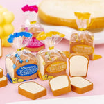 Confezione da 5 gomme da cancellare a forma di toast con simpatici cartoni animati