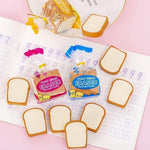 Confezione da 5 gomme da cancellare a forma di toast con simpatici cartoni animati