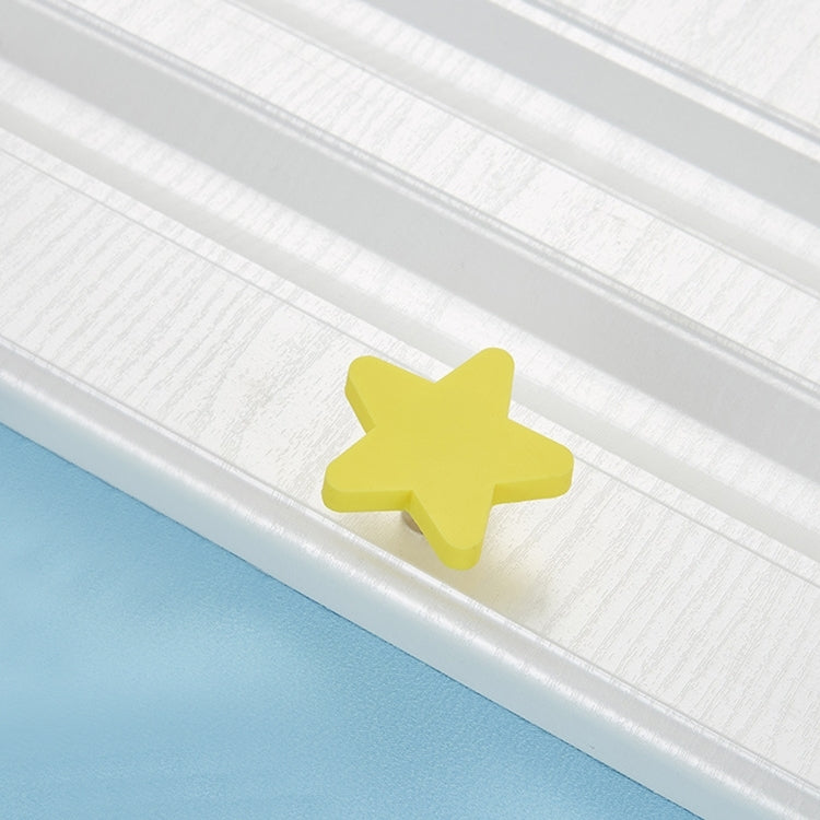 Maniglia cassettiera bambini in silicone con stella gialla