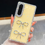 Custodia antiurto con doppio fiocco e glitter per Samsung Galaxy A17, A56, A26 e