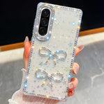 Custodia antiurto con doppio fiocco e glitter per Samsung Galaxy A17, A56, A26 e