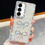 Custodia antiurto con doppio fiocco e glitter per Samsung Galaxy S24 FE, A15
