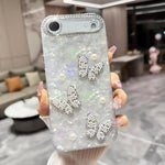 Custodia con texture conchiglia, perle e glitter per iPhone 16 Pr