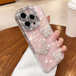Custodia con texture conchiglia, perle e glitter per iPhone 16 Pr