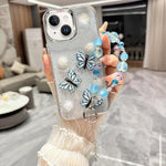 Custodia TPU con farfalla 3D glitterata per iPhone 12 e 13