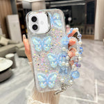Custodia TPU con farfalla 3D glitterata per iPhone 16 Pro Max