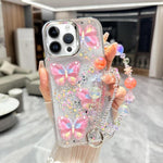 Custodia TPU con farfalla 3D glitterata e catena per iPhone 15 Pr