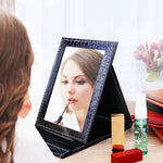 Specchio cosmetico portatile in pelle con supporto