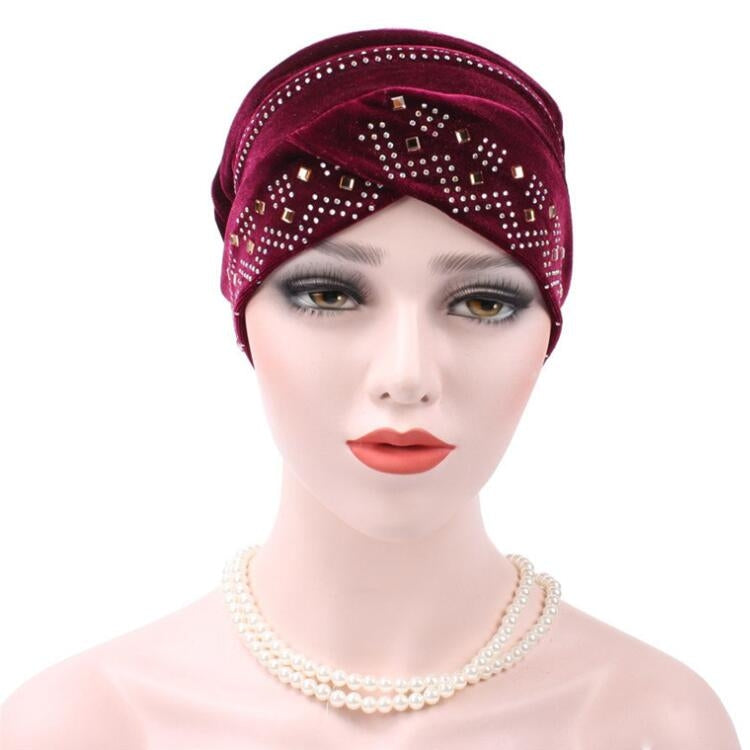 Cappello impilabile con turbante e strass in pleuche