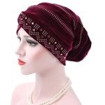 Cappello impilabile con turbante e strass in pleuche