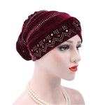 Cappello impilabile con turbante e strass in pleuche