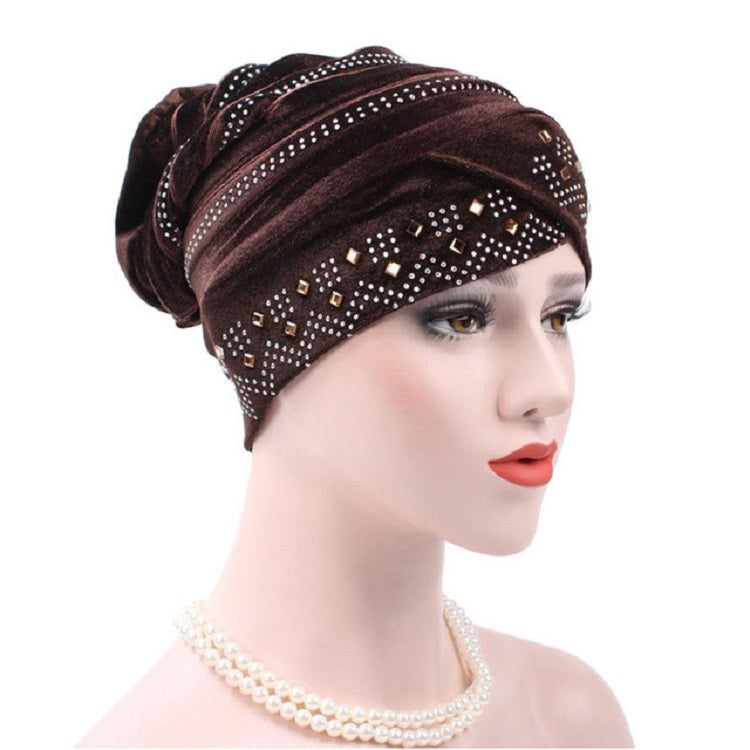 Cappello impilabile con turbante e strass in pleuche