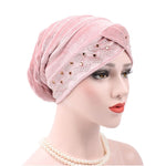 Cappello impilabile con turbante e strass in pleuche