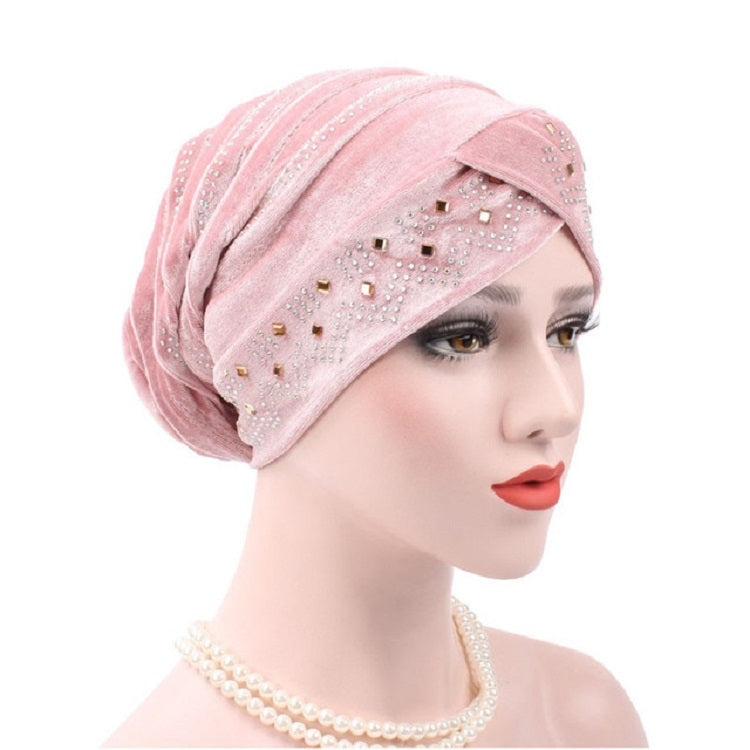 Cappello impilabile con turbante e strass in pleuche