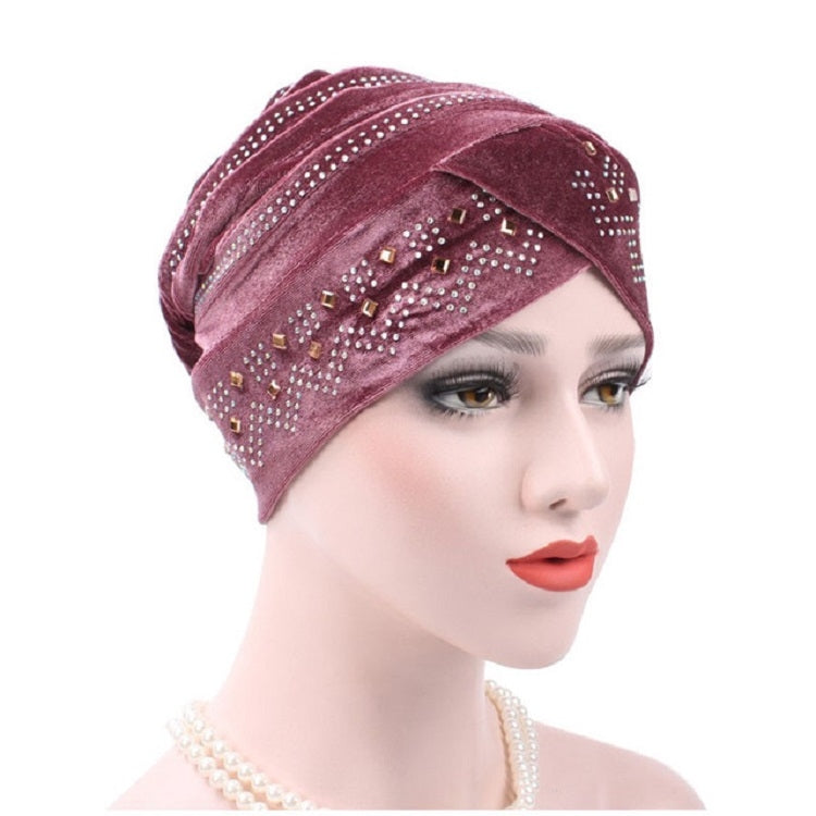 Cappello impilabile con turbante e strass in pleuche