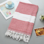 Asciugamano da bagno in cotone a righe con nappe