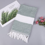 Asciugamano da bagno in cotone a righe con nappe