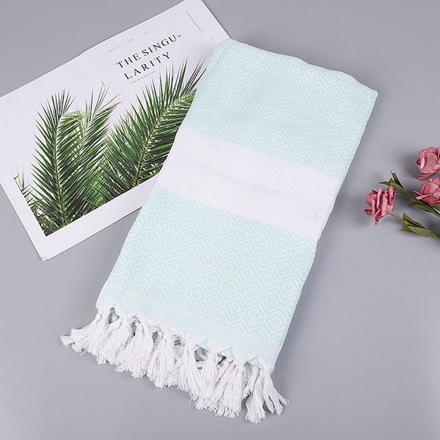 Asciugamano da bagno in cotone a righe con nappe