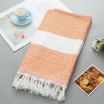 Asciugamano da bagno in cotone a righe con nappe