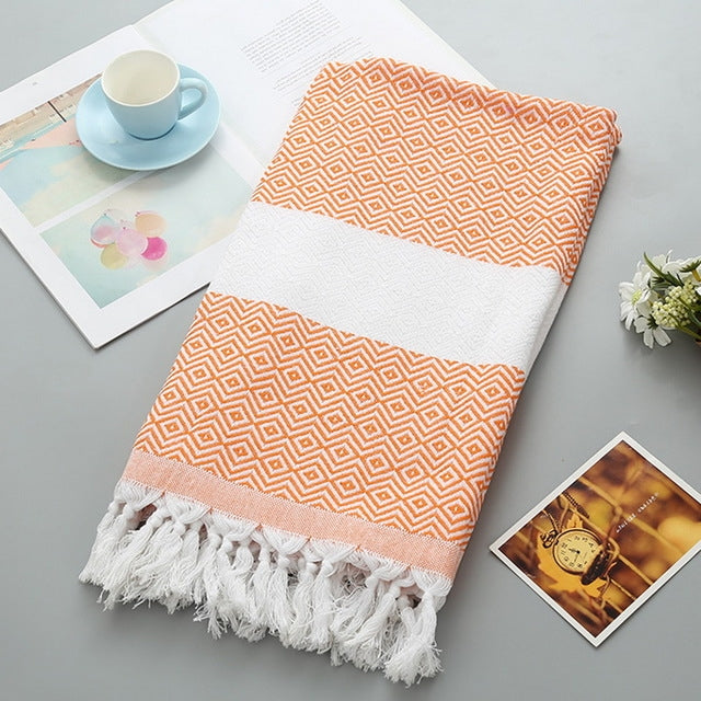 Asciugamano da bagno in cotone a righe con nappe