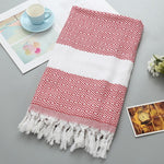 Asciugamano da bagno in cotone a righe con nappe