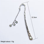Segnalibro luminoso in metallo Sun Moon Star 12,3 cm