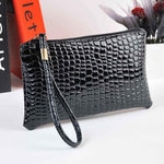 Portafoglio pochette donna motivo coccodrillo lungo
