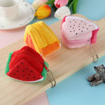Portamonete triangolare in peluche motivo frutta 9x6 cm