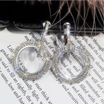 Orecchini rotondi donna con cristalli e strass