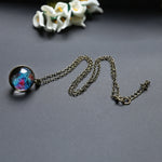 Collana con pendente galassia in vetro doppia faccia