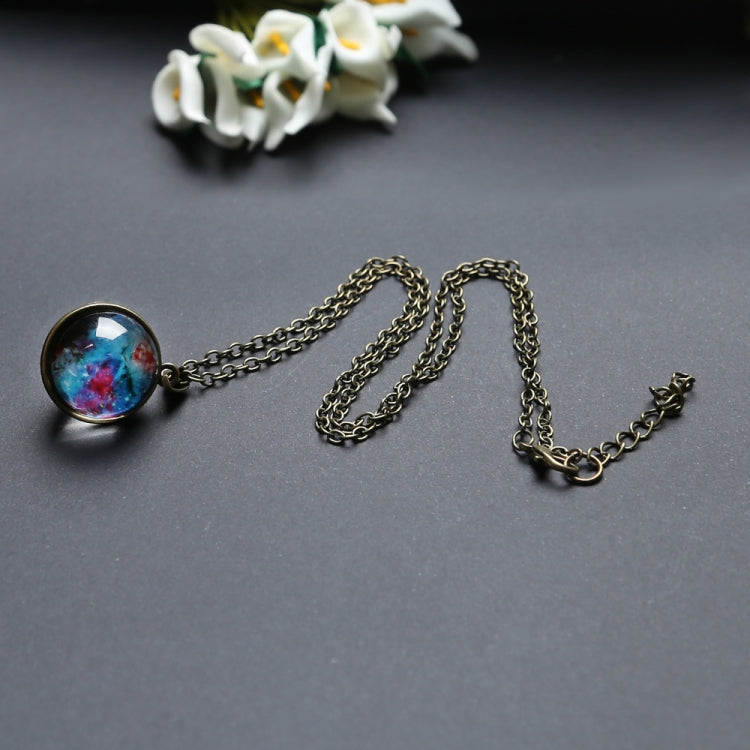 Collana con pendente galassia in vetro doppia faccia