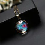 Collana con pendente galassia in vetro doppia faccia