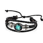 Bracciale rigido con perline e costellazioni in pelle