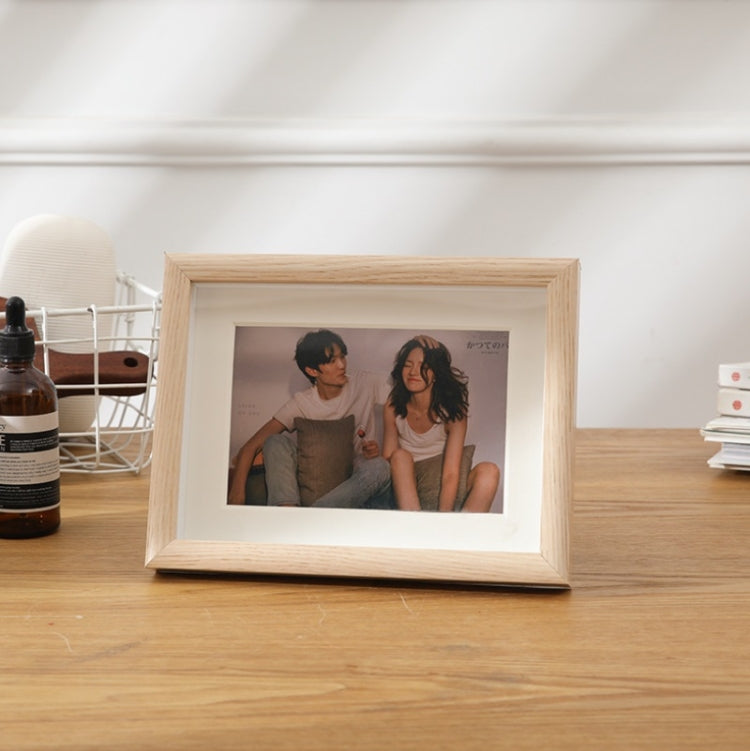 Pendolo a parete in legno con cornici multiple