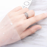Anello regolabile quadrifoglio in rame con gemme