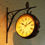 Orologio da parete doppio lato in ferro 33x29 cm